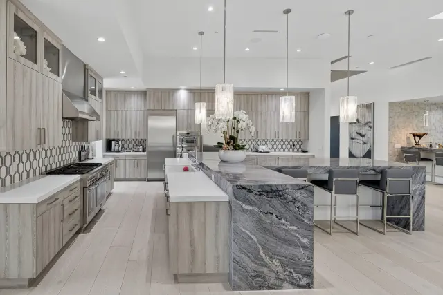 Custom kitchen island with seating in a remodeled Las Vegas home
